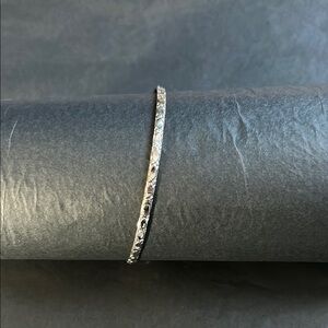 Elegant Silver Bangle Bracelet With Detail